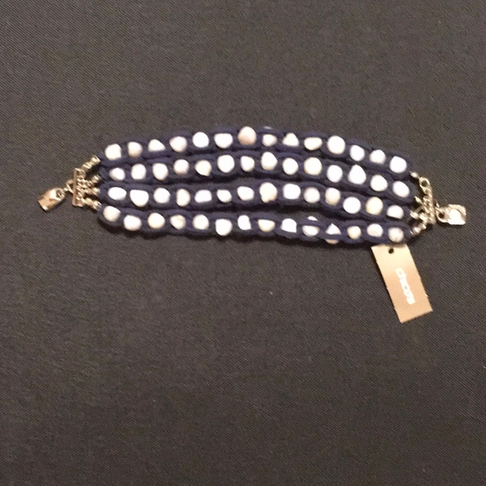 NWT,CHICO'S Magnetic freshwater pearls and navy bracelet. 4 strands,silver